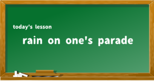 rain on one's parade